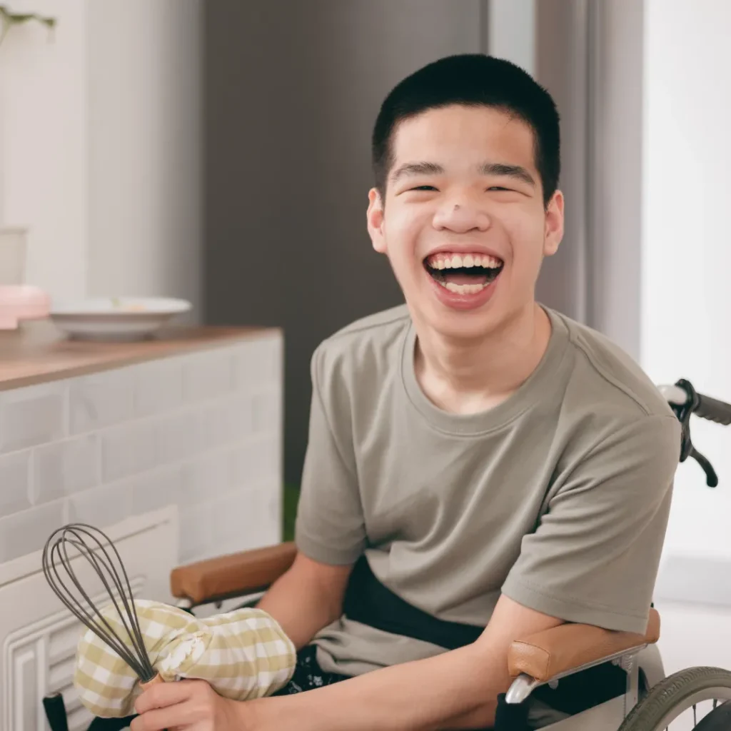 Disabled boy in wheelchair smiling